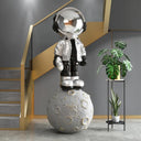 Astronaut on Earth sculpture, alternate view
