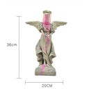 Pour The Paint Angel sculpture, alternate view