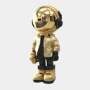 The Gilded Listener gold astronaut figure