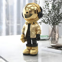The Gilded Listener astronaut figure, alternate view