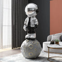 Astronaut on Earth sculpture