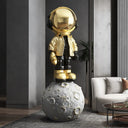 Astronaut on Earth sculpture, alternate view