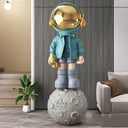 Astronaut on Earth sculpture, alternate view