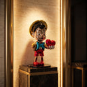 The Dealmaker sculpture, alternate view